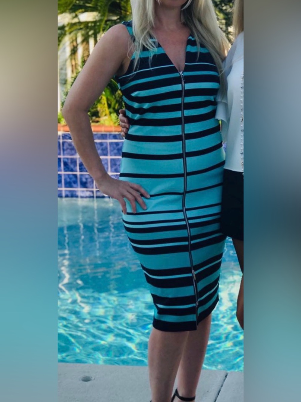 Striped Sleeveless Zip-Front Midi Dress in Teal and Black.